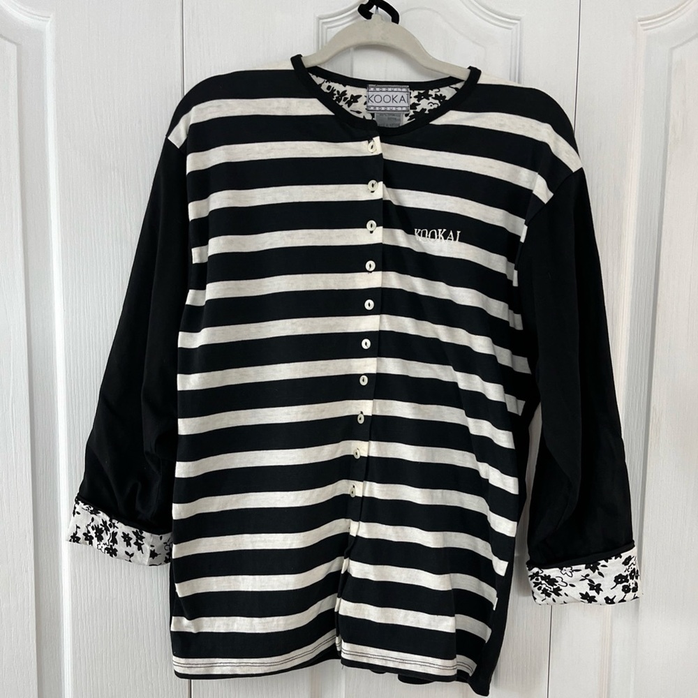 Vintage Kookai black & white striped top with floral lined sleeves.